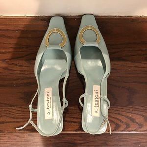Light blue heels with yellow buckle
